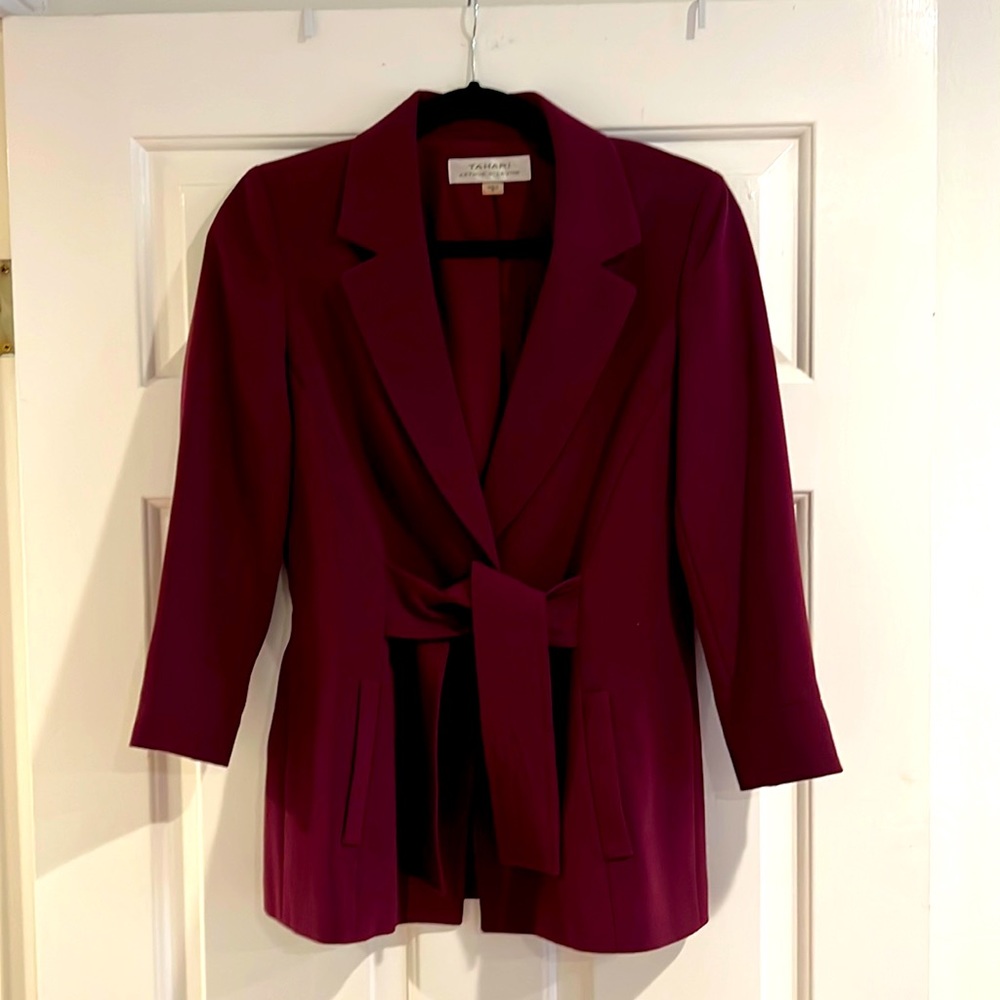 Super cute snap front jacket with front self tie..